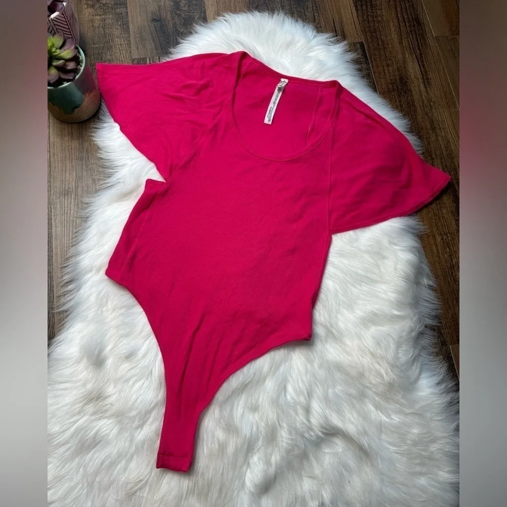 FREE PEOPLE
Byron Ribbed Flutter-Sleeve Bodysuit - Picture 3 of 6